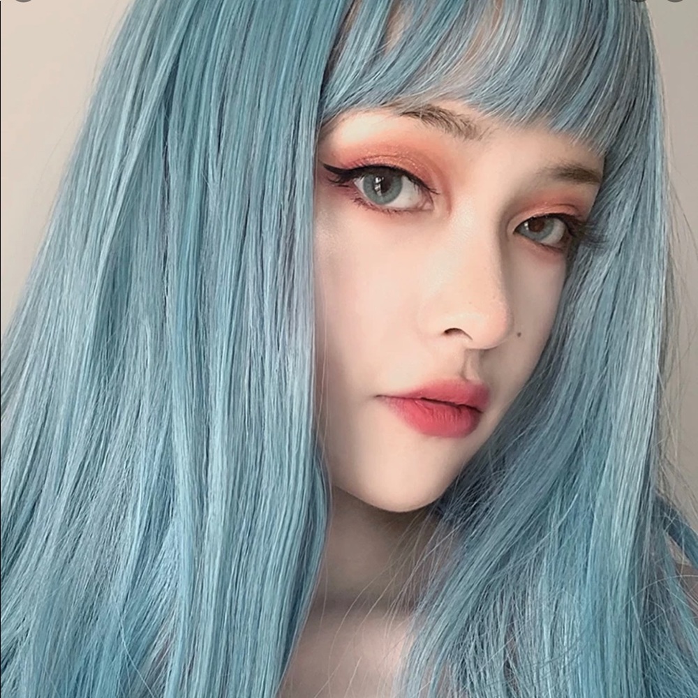 Light blue wig.